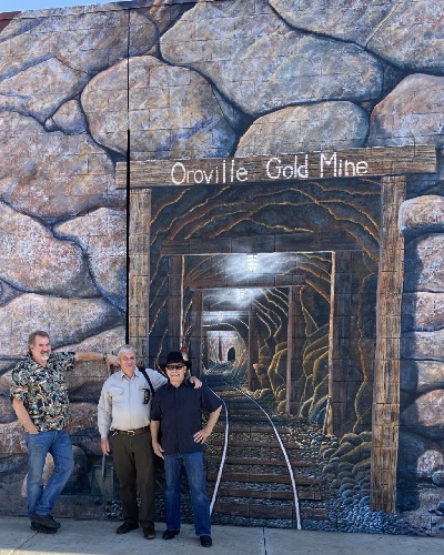 Congressman Doug LaMalfa on the left with Frank Wilson and Ted Hanson in front of the Gold Mine Mural during a dedication ceremony in Feburary of 2020.